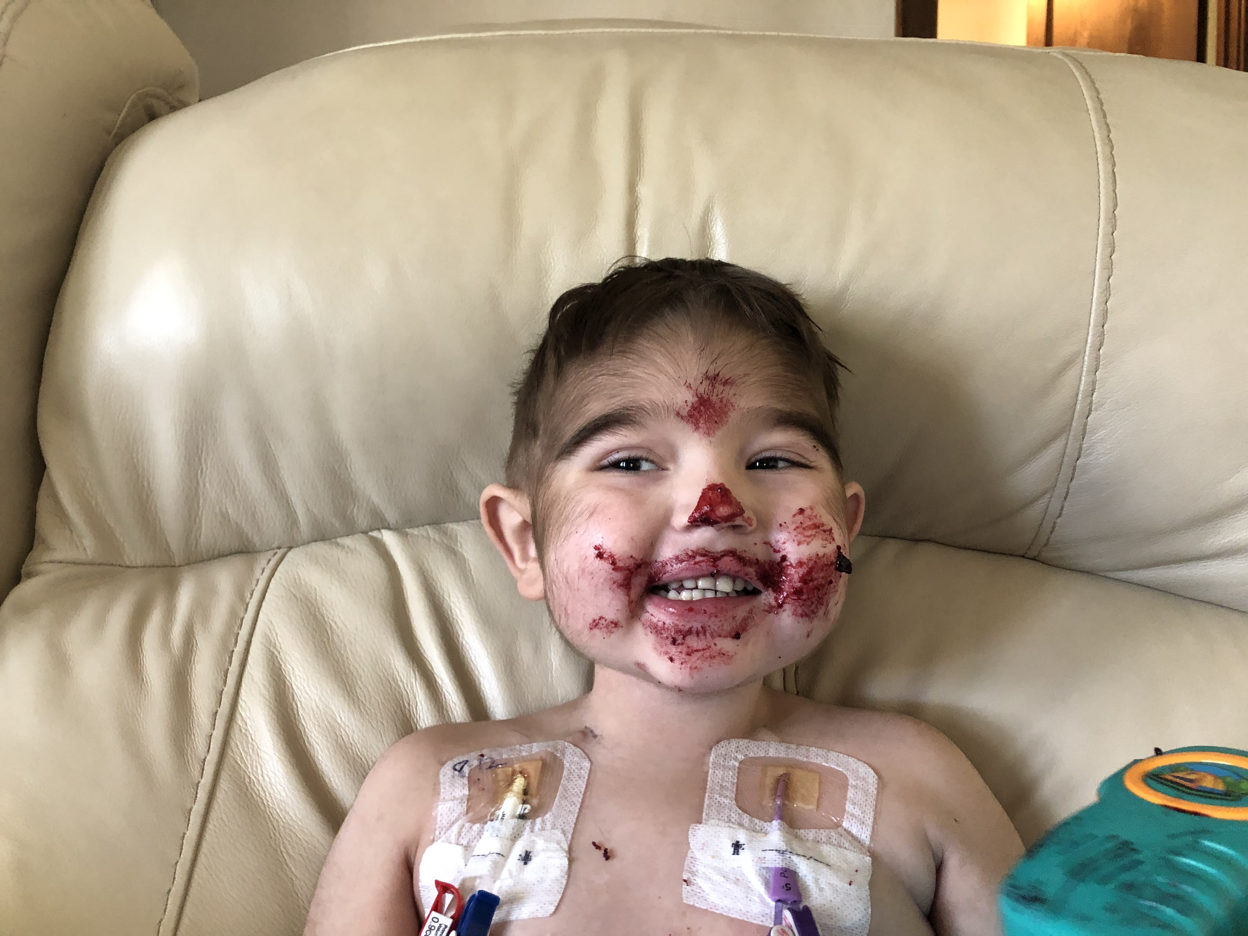 Jordan smiling with family and friends